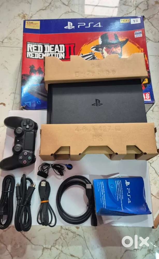 Sony ps4 slim 1Tb with 10 game CD