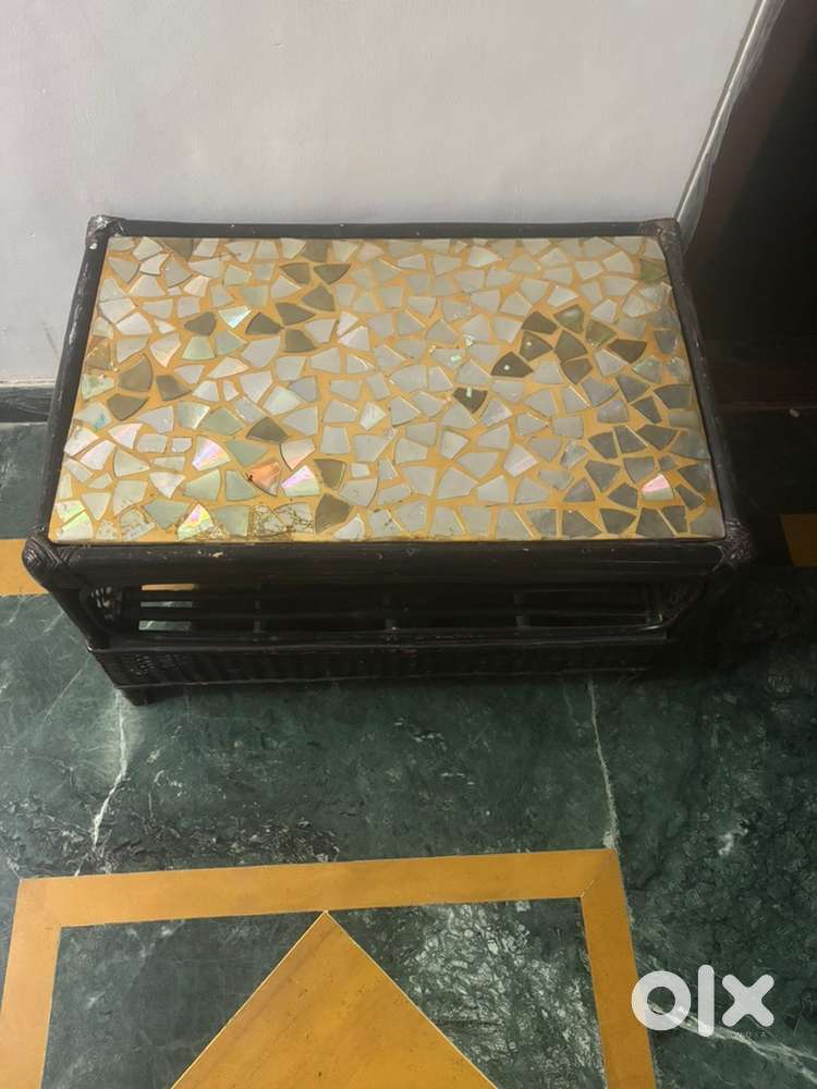 Cane table with resin top