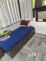 Bed with a large sliding unit in it