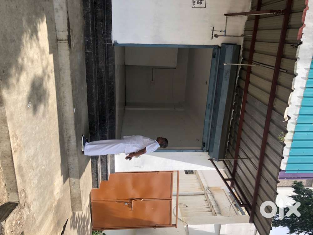 One shop with shutter and washing room