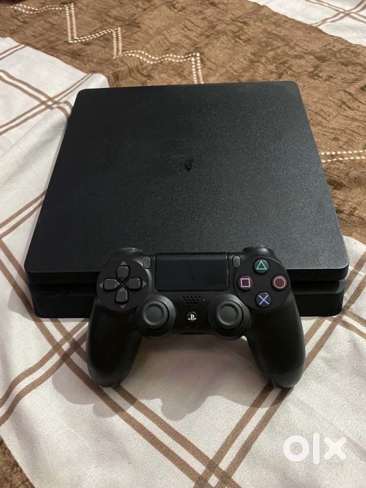 PS4 Slim 1 TB Scratch less condition with  playstation seal.