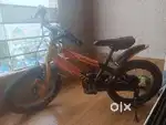 Radiant Kids Bicycle in Orange and Black colour