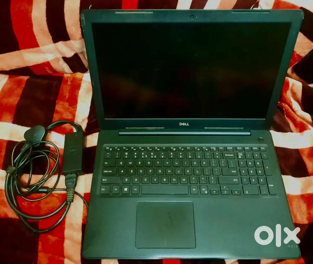 DELL LAPTOP  ( Working Perfectly with Original Charger, new Battery)
