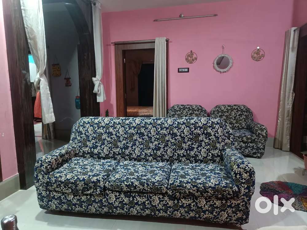 Sofa set with wood and wrapped in cover