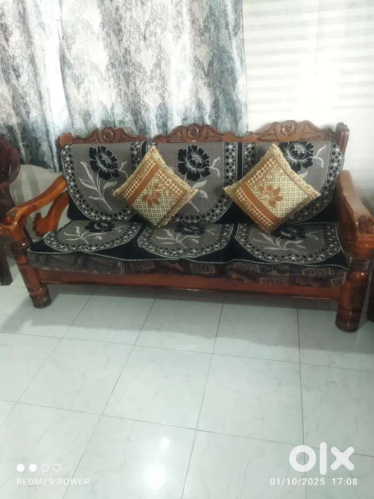 Wooden sofa set with cover