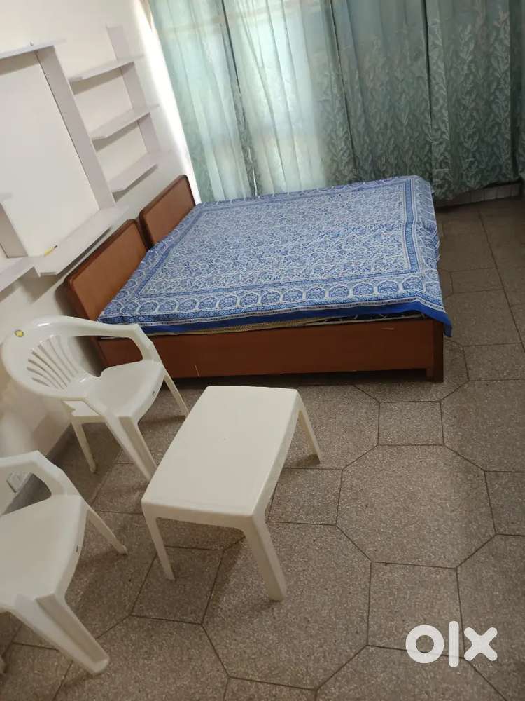 One room set with ac double bed mattress cylender burner cupboard etc.