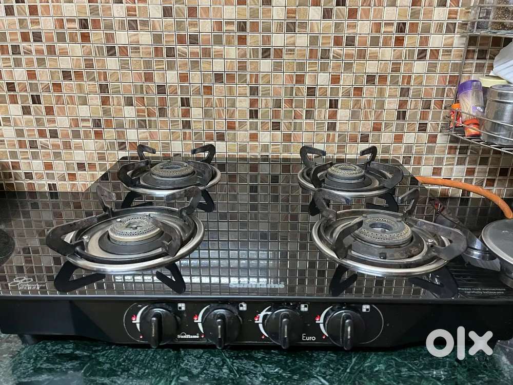 4 burner GLASS gas stove - Excellent working condition