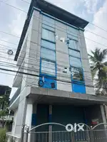 13.5 cent plot with 4BHK commercial building for sale at Chambakkara.