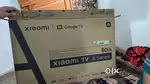 MI tv 1 month old new condition with bill and original packaging