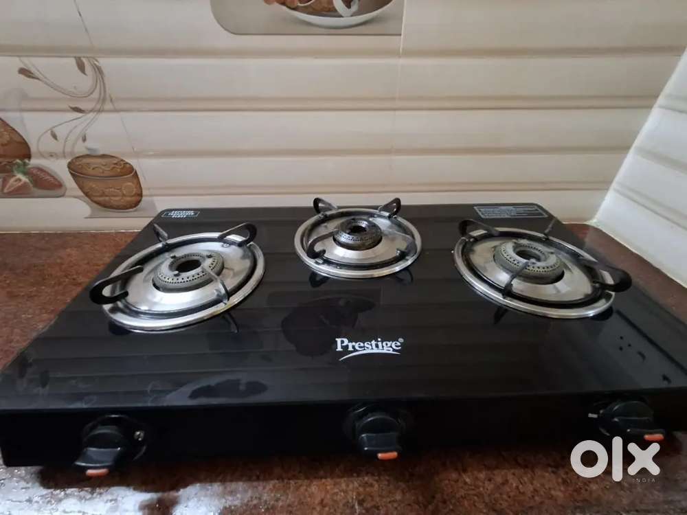 3 burner stove and 2 stone grinder
