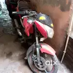 Red colour bajaj pulsar 135 LS Delhi ragistration