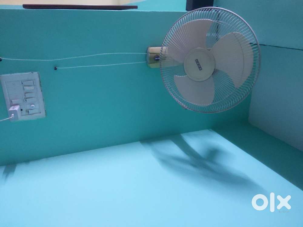 Usha brand wall mounted fan in working condition