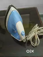 Press iron with spray pump