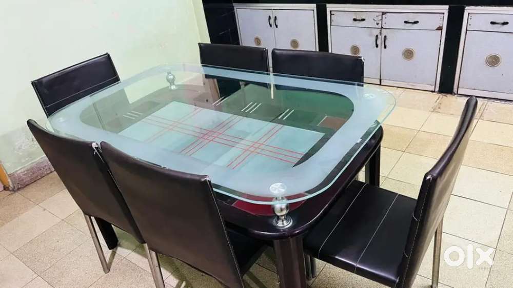 Designer 6 seater Glass dining table.