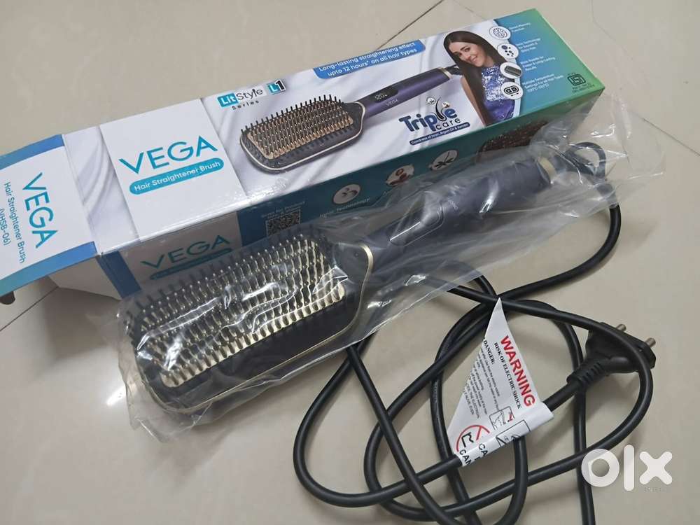 Vega - brush hair straightner