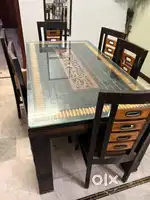 6- Seater dining table (25000, negotiable)