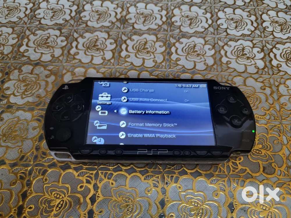Sony PSP 2000 (Playstation portable) with games & charger