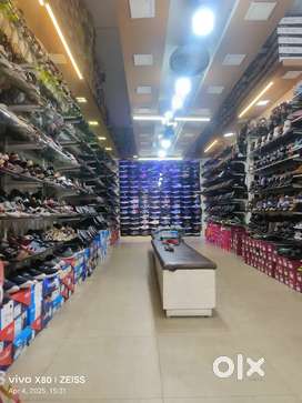 Sales executive girl request foot ware showroom
