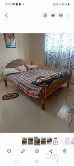 Wooden double bed two numbers at Kalinganagar  k 7 to be sold