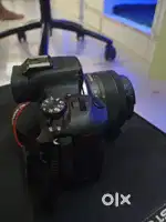 Cannon R100 With Kit lens 18-45 2 Battery 1 Charger