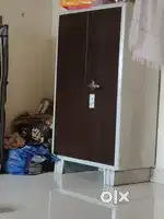 Small metal cupboard and folding table