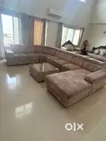8 seater sofa set with center table in a new condition hardly used