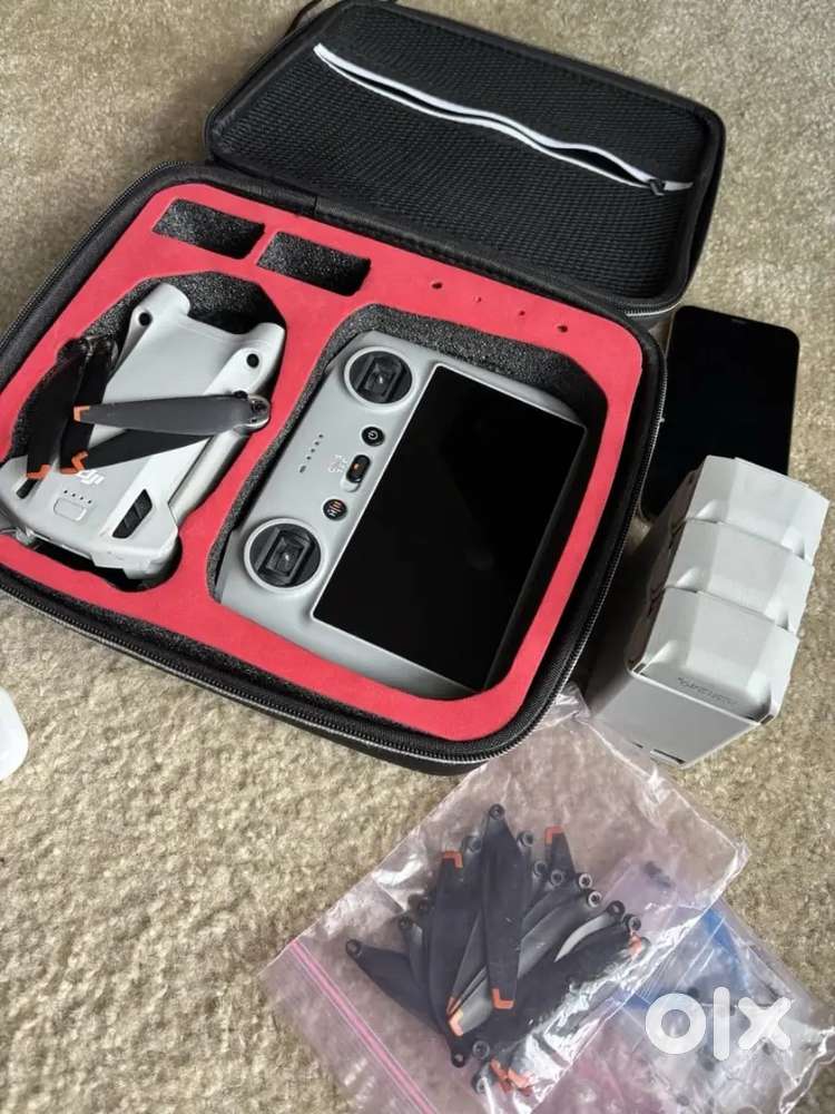DJI Mini 3 Pro Camera Drone (with RC Remote), Fly More Kit, and carry