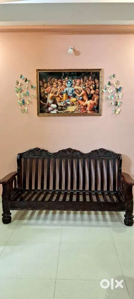 Good quality fine wood 3 wide seater sofa