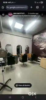 Hair dresser in salon male section