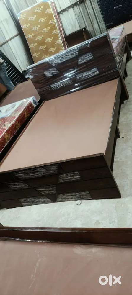 Jailaxmi furnitures.affordable queen size bed without storage cot