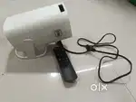 Portable projector with curtain
