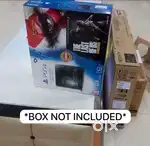 PS4 Standard 1TB Edition With 5 
Games