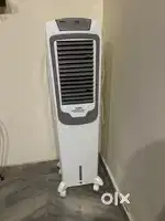 USHA Aerostyle 50 Cooler..under 1 yr warranty..only 2 months old