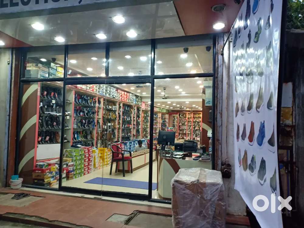 Salesman in Shoes Showroom