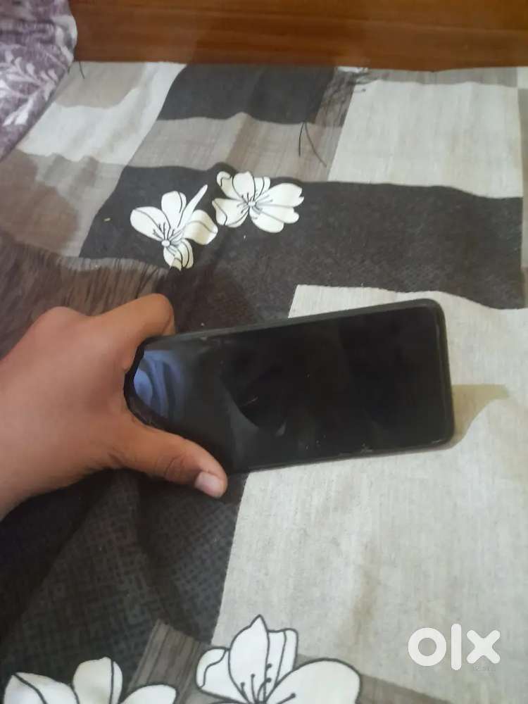 Oppo A54 mobile phone under 15 thousand rupees with charger and cable