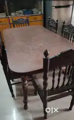 Wooden dining table with 6 chairs