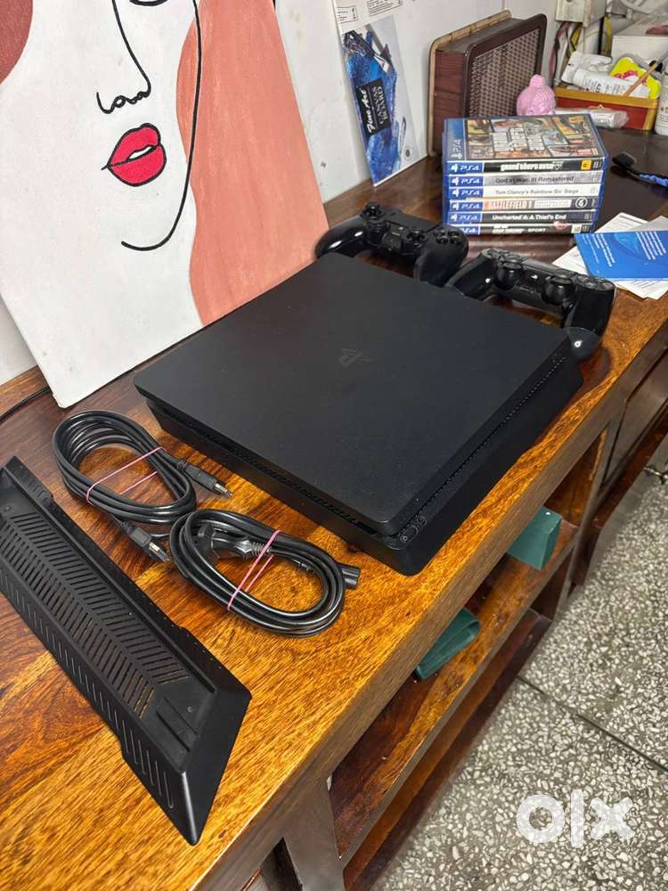 Barely Used PS4 Slim 500GB + 2 Controllers – Works Perfectly
