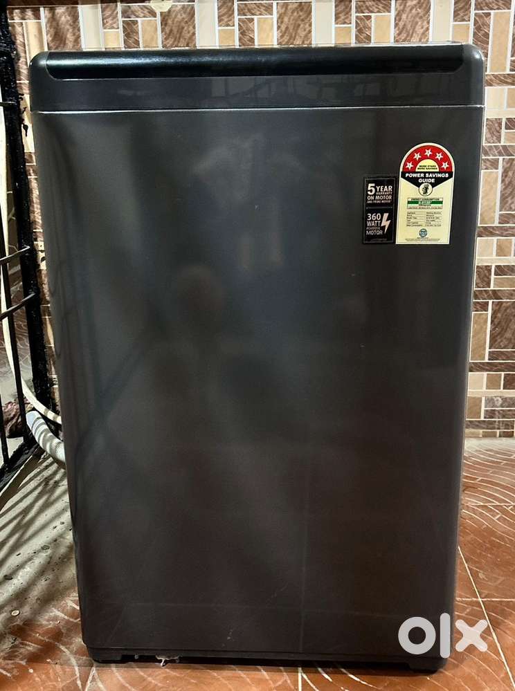 Whirlpool Fridge and top load machine in excellent condition