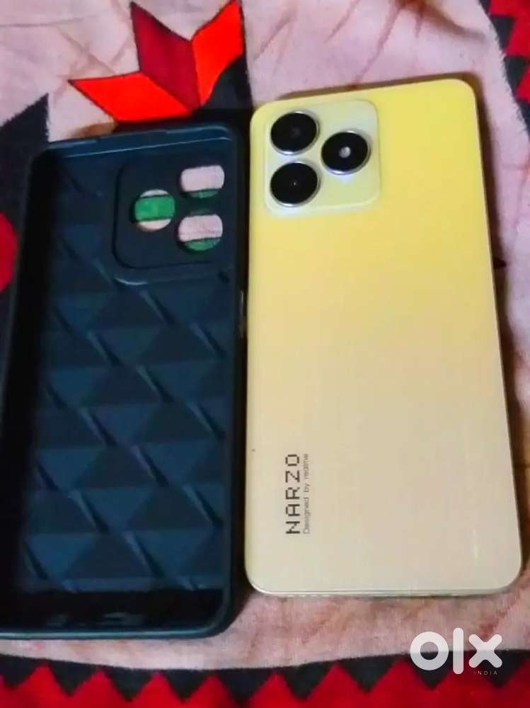 Realme Narzo n53 Gold Feather look Ram :- 6gb Storage :- 128gb