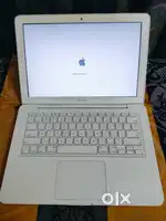MacOS High Sierra laptop working condition white premium colour.
