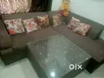 Selling 6 seater sofa with 2 puffies and centre table