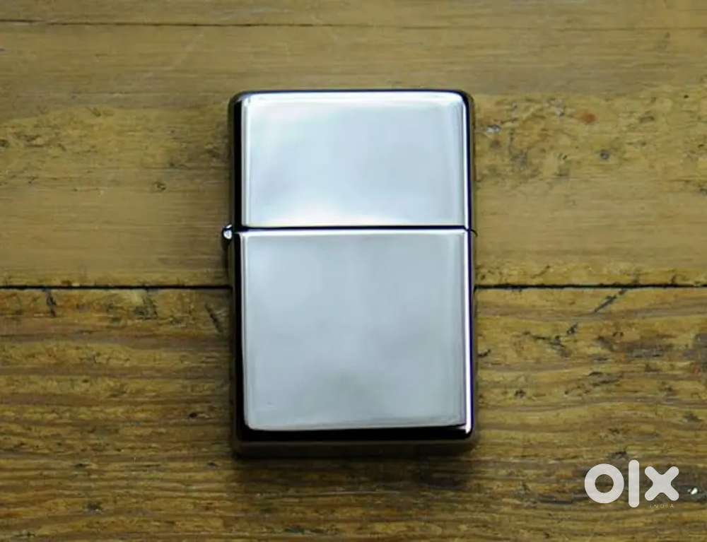 Zippo Classic Chrome Lighter with additional accessories.