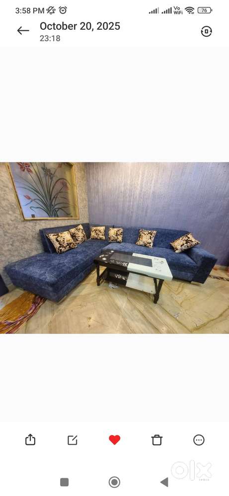 L shape sofa with center table