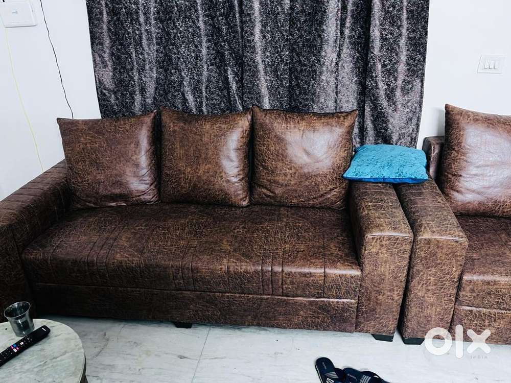 5 seater leather-Brown sofa