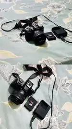 Canon R 50 Camera  35 mm Lens 2 Battery  128 Gb SD Card