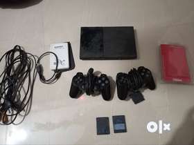 Package contains PS2 with 2 dual shock  original controllers   Hard disk with mote than 100 top game...