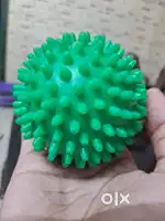 Neck, back, foot massaging spiky ball for muscle relaxation