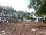 6 Cents of solid land inside a gated communiry. 1km from Mukkola