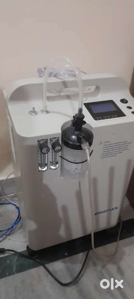 oxygen concentrator  10 ltr 2months old