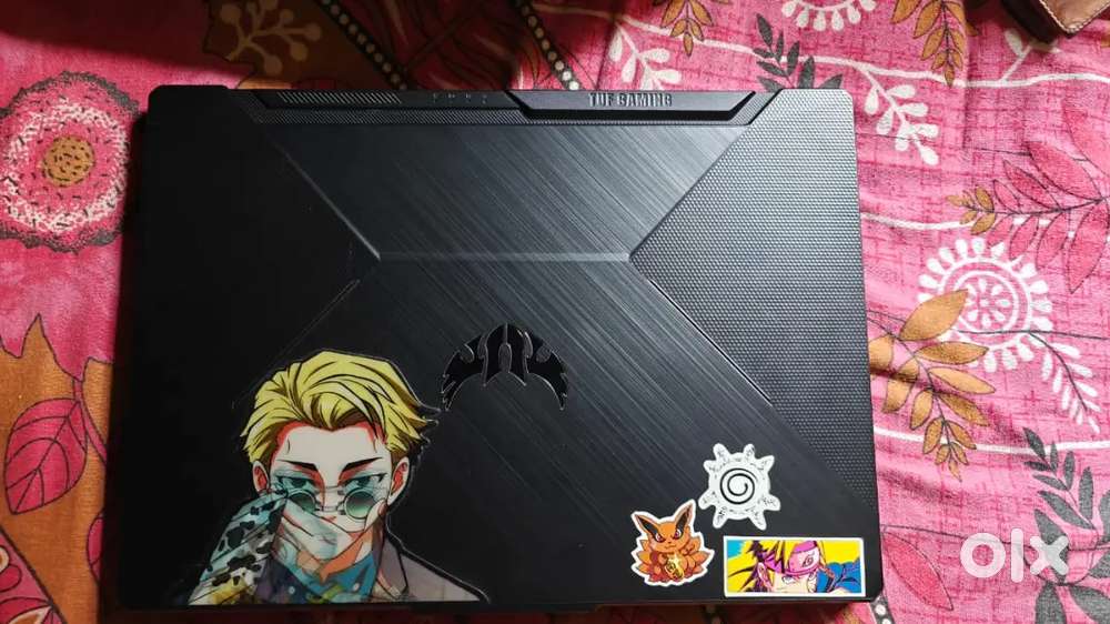 Asus ROG TUF Gaming Laptop with accessories set